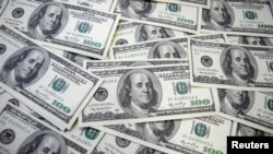 ARHIVA - Američki dolar (Foto:Reuters/Lee Jae-Won)