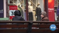 Solemn Kyiv Copes with Bombs, Gunfire