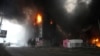 A building burns after shelling in Kyiv, Ukraine, March 3, 2022. 