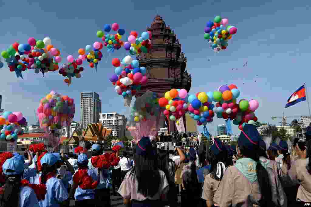 Balloons are released at the Independence Monument during a ceremony marking Cambodia's 69th Independence Day celebrations in Phnom Penh.