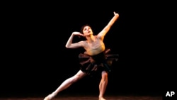 FILE - Natalia Osipova, of the Bolshoi Theatre, performs during Reflections ballet spectacle in the Bolshoi Theatre in Moscow, Jan. 26, 2011. 