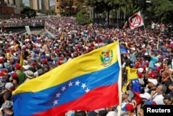 Opposition supporters take part in a rally against Venezuelan President Nicolas Maduro's government in Caracas, Venezuela Jan. 23, 2019.