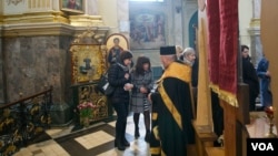 Archbishop Vasyl Semeniuk sees Vladimir Putin’s army as an evil that must be totally overcome so that it can’t attack Ukraine again or others. His sentiment is not out of line with the thoughts of many in his flock. (Jamie Dettmer/VOA)