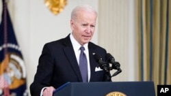 President Joe Biden speaks about Russian President Vladimir Putin and Russia's invasion of Ukraine, in the State Dining Room of the White House in Washington, March 28, 2022.