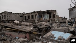 A damaged school is seen following a Russian attack occurred in mid-March, on the outskirts of Mykolaiv, Ukraine, April 1, 2022.