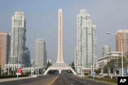 This photo shows a general view of the Ryomyong street in Pyongyang, North Korea Monday, May 16, 2022. North Korea restricted movement in Pyongyang and other cities last week to stop the spread of the virus. (AP Photo/Jon Chol Jin)