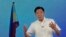FILE - Presidential candidate Ferdinand "Bongbong" Marcos Jr. gestures during a live broadcast at his headquarters in Mandaluyong, Philippines, May 11, 2022. 