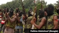 Gunmen in soldiers vests