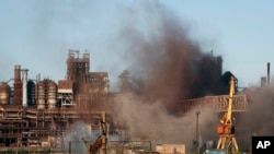 Smoke rises from the Metallurgical Combine Azovstal in Mariupol during shelling, in Mariupol, in eastern Ukraine, May 7, 2022.