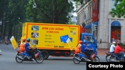 DongA Bank has a traveling vehicle with cash machines to serve customers in many locations. (DongA Bank)