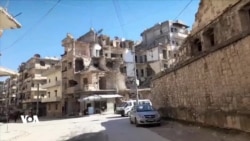 دیمەنی وێرانکارییەکانی گەڕەکی ئەشرەفیە لە شاری حەلەب کە دانیشتوانەکەی کوردن