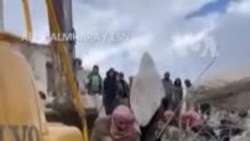  ساتی ڕزگارکردنی منداڵێکی تازە لەدایکبوو لە عەفرین کە هێشتا وێڵاشەکەی پێوەیە