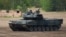 FILE - A Leopard 2 A7 main battle tank of the German armed forces Bundeswehr takes part in an educational practice in Munster, Germany, on May 20, 2019.