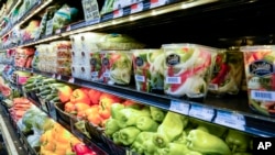 Vegetais à venda num supermercado em Nova Iorque (Foto de Arquivo)