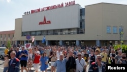 Minsk avtomobil zavodidagi namoyish