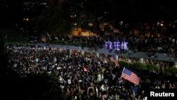 Anti-government demonstrators march in protest against the invocation of the emergency laws in Hong Kong, China, October 14, 2019. REUTERS/Umit Bektas