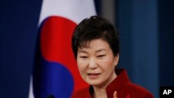 South Korean President Park Geun-hye answers to a reporter's question during her news conference in Seoul in January.