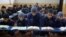 FILE - Afghan boys read the Quran in a madrassa, or religious school, during the Muslim holy month of Ramadan in Kabul, Afghanistan, April 18, 2021. The number of madrassas has grown fourfold in Afghanistan since the Taliban seized power in 2021.