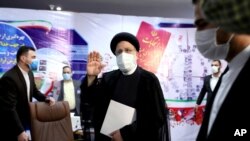 Ebrahim Raisi, head of Iran's judiciary, visits the Interior Ministry to register his candidacy for the June 18 presidential elections at the elections headquarters in Tehran, Iran, May 15, 2021.