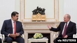 El presidente ruso, Vladimir Putin, a la derecha, se reúne con su homólogo venezolano, Nicolás Maduro, en el Kremlin, en Moscú, el 25 de septiembre de 2019.
