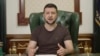 In this image from video provided by the Ukrainian Presidential Press Office, Ukrainian President Volodymyr Zelenskyy speaks from Kyiv, Ukraine, early Sunday, March 20, 2022. (Ukrainian Presidential Press Office via AP)