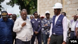 Governador Marcos Nhunga (esquerda)