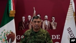 墨西哥國防部長桑多瓦爾在墨西哥城記者會上宣布抓獲奧維迪奧（2023年1月5日）
