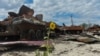 Destroyed Russian military vehicles at a compound of an agricultural farm, which was used by Russian troops as a military base during Russia's attack on Ukraine, in Kharkiv Region, Ukraine, July 17, 2022. 