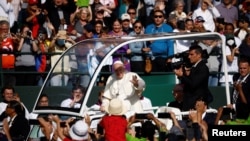 Pope Francis arrives to preside a mass at Commonwealth Stadium in Edmonton, Alberta, Canada, July 26, 2022.