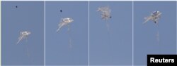 FILE - A combination picture shows an Israeli drone intercepting a Palestinian kite in an area where kites and balloons have caused blazes, on the Israeli side of the border between Israel and the Gaza Strip, June 8, 2018.
