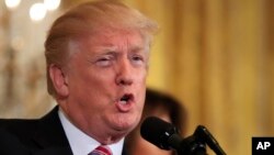 President Donald Trump in the East Room of the White House, Tuesday, Feb. 13, 2018, in Washington. 