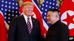 President Donald Trump meets North Korean leader Kim Jong Un, Feb. 27, 2019, in Hanoi. (AP Photo/ Evan Vucci)