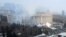 Smoke rises from the city hall building during a protest in Almaty, Kazakhstan, Jan. 5, 2022.