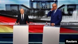 Kancelari gjerman i Partisë Social-Demokrate (SPD), Olaf Scholz dhe rivali i tij nga Partia Kristian-Demokrate (CDU) Freidrich Merz gjatë një debati në Welt TV para zgjedhjeve në Gjermani/Fotografi arkivi/Reuters