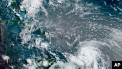 Picha za Satellite zikionyesha dharuba ya kimbunga Elsa kikipita Caribbean, juu ya Barbados, Julai 2, 2021, saa 12:00 Z (8am a.m. ET).