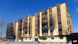 Libya's charred parliament building is seen in Tobruk, Libya, July 2, 2022. 