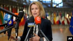 FILE - European Union foreign policy chief Kaja Kallas speaks with the media as she arrives for a meeting of EU foreign ministers at the European Council building in Brussels, Jan. 27, 2025. 