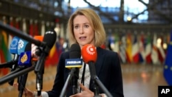 FILE - European Union foreign policy chief Kaja Kallas speaks with the media as she arrives for a meeting of EU foreign ministers at the European Council building in Brussels, Jan. 27, 2025. 