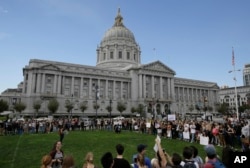 California high school students gather to protest in opposition of Donald Trump's presidential election victory outside of City Hall in San Francisco, Thursday, November 10, 2016.