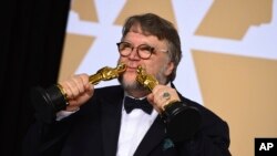 People visit Luke Jerram's "In Memoriam," a temporary memorial artwork for all those who lost their lives due to COVID-19, in Seaton Carew Park, Hartlepool, Britain.