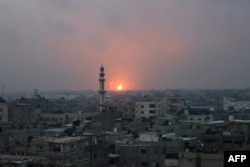 This picture taken from Rafah in the southern Gaza Strip on Dec. 5, 2023, shows an explosion in Khan Yunis as battles between Israel and Hamas militants continue.