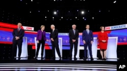 Kandidati za demokratsku nominaciju, biznismen Tom Stajer, senatorka Elizabet Voren, bivši potpredsednik Džo Bajden, senator Berni Sanders, bivši gradonačelnik Saut Benda Pit Butidžidž i senatorka Emi Klobučar 