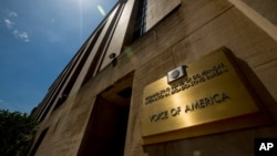 FILE - The facade of the Voice of America building is seen in Washington, June 15, 2020.