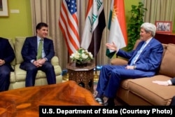 U.S. Secretary of State John Kerry, right, sits with Kurdistan Regional Government Prime Minister Nechirvan Barzani, at the Chief of Mission Residence at the U.S. Embassy in Baghdad, Iraq, April 8, 2016.
