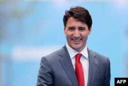 In this file photo Canadian Prime Minister Justin Trudeau arrives to attend the North Atlantic Treaty Organization (NATO) summit in Brussels on July 12, 2018.