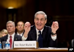 Then FBI Director Robert Mueller testifies on Capitol Hill in Washington, June 19, 2013, before the Senate Judiciary Committee.