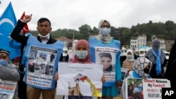 FILE - Members of Uyghur community living in Turkey protest outside the Chinese Consulate in Istanbul, June 2, 2021. They were protesting China's alleged oppression of Uyghur Muslims in far-western Xinjiang province.