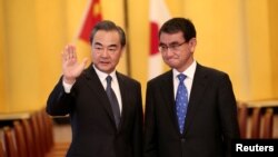 中國國務委員兼外交部長王毅和日本外相河野太郎2018年4月15日在日本東京舉行會談。