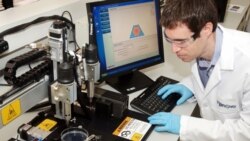 Scott Dorfman, an engineer at Organovo, working on the NovoGen bio-printer