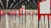 FILE - Voting stations are set up for a primary election at the Kentucky Exposition Center, in Louisville, Kentucky, June 22, 2020.